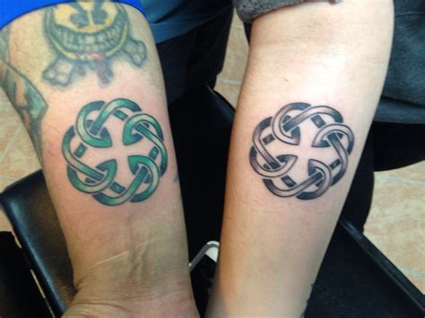 Celtic Motherhood Tattoo. . Father daughter celtic tattoo